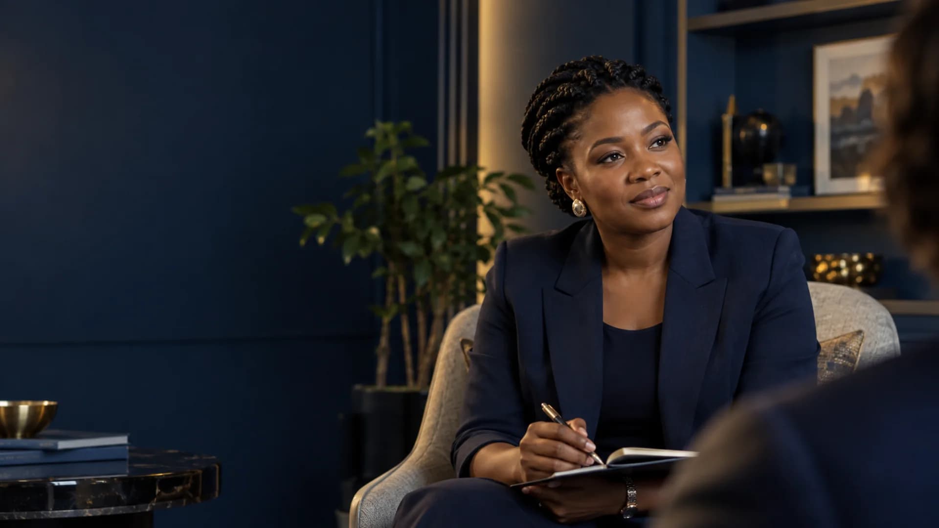 A customer experience consultant listening attentively during a leadership conversation